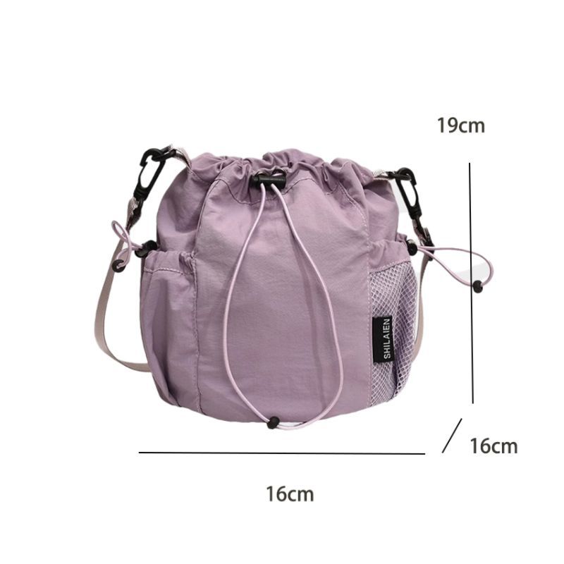 Casual mini crossbody bag women's niche light bag 2025 new mobile phone bag versatile drawstring bucket bag
