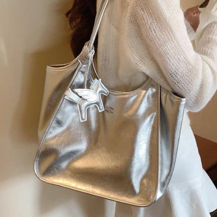 "Meet The Micro Light Tote Bag, A Woman's Silver Texture, High-end Commuting Handbag, A Large Shoulder Bag.