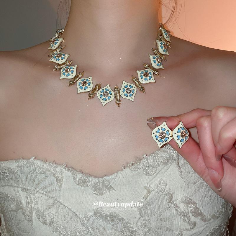 Vintage diamond-accented diamond heart bracelet, necklace, and earrings fashion jewelry set