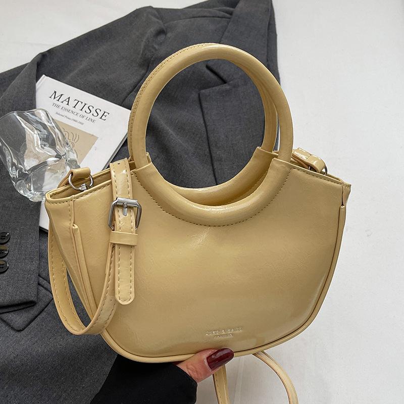 

2025 fashion new design casual oil wax leather portable bucket bag simple and versatile solid color temperament messenger women s bag