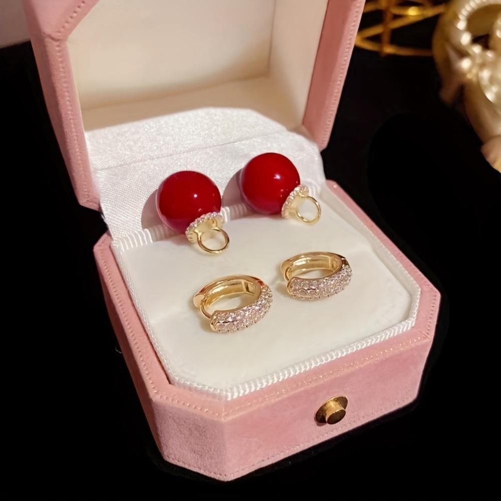 A Pair of New Earrings Paired with Luxurious and Fashionable Red Earrings