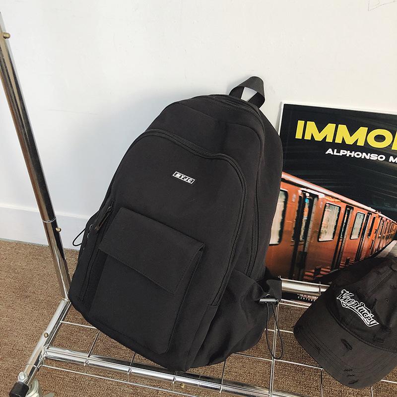 

Casual versatile large-capacity backpack female new student schoolbag niche sports travel backpack чёрный