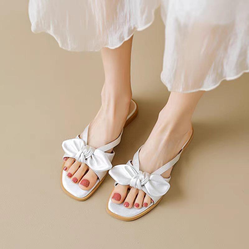 

Flat-bottomed slippers women s summer wear 2025 new fairy style pink bow word seaside beach cool slippers 40