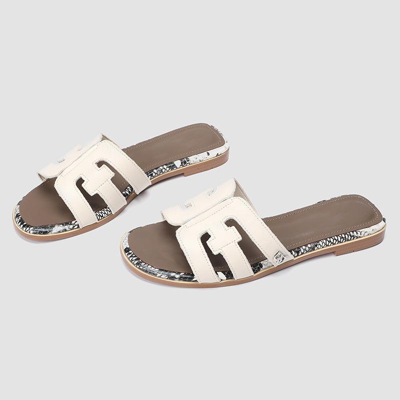 

Spot version~ Internet celebrity leather slippers women s summer wear Korean version of fashion versatile one-word drag flat-bottomed beach cool 35