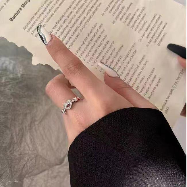 Entwined Love Zircon Ring: Elegant Design for Couples
