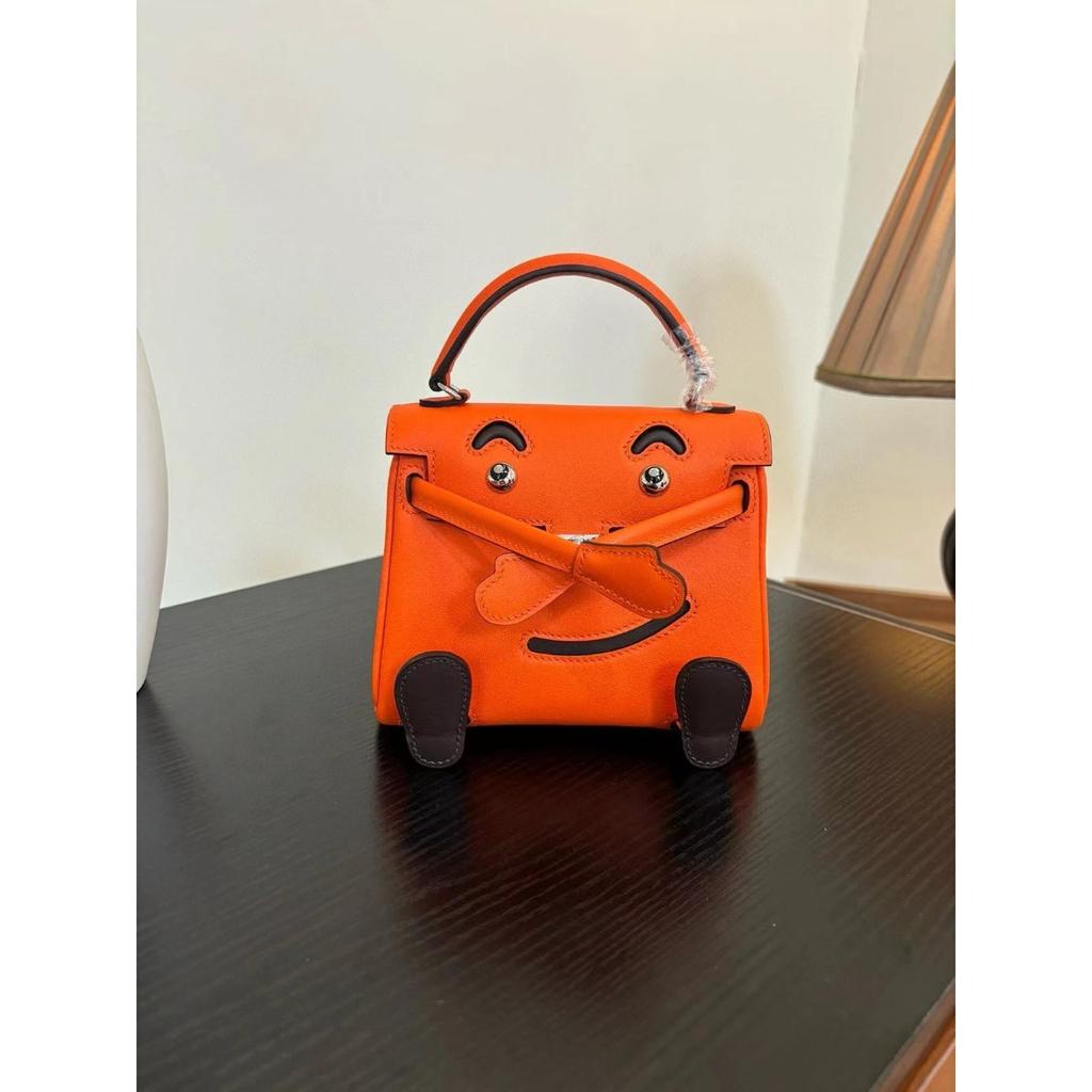 Borsa a faccina sorridente nuova per la primavera e l'estate 2025 borsa Kelli mini in pelle bovina di primo strato di alta gamma borsa a tracolla carina da millenial