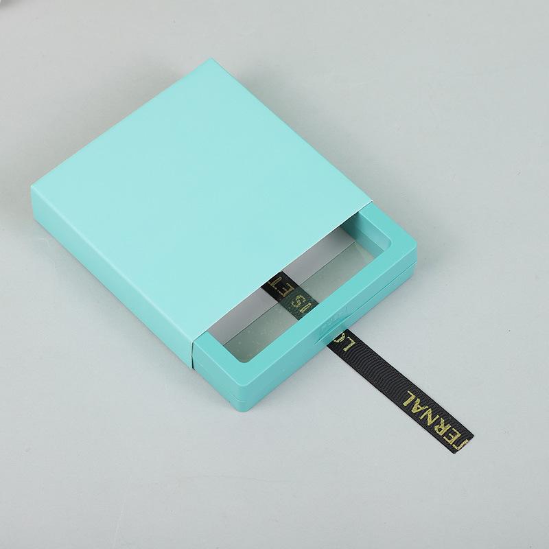 Aufbewahrungsbox für Nagelkunst mit PE-Folie und farbiger Kartenhülle