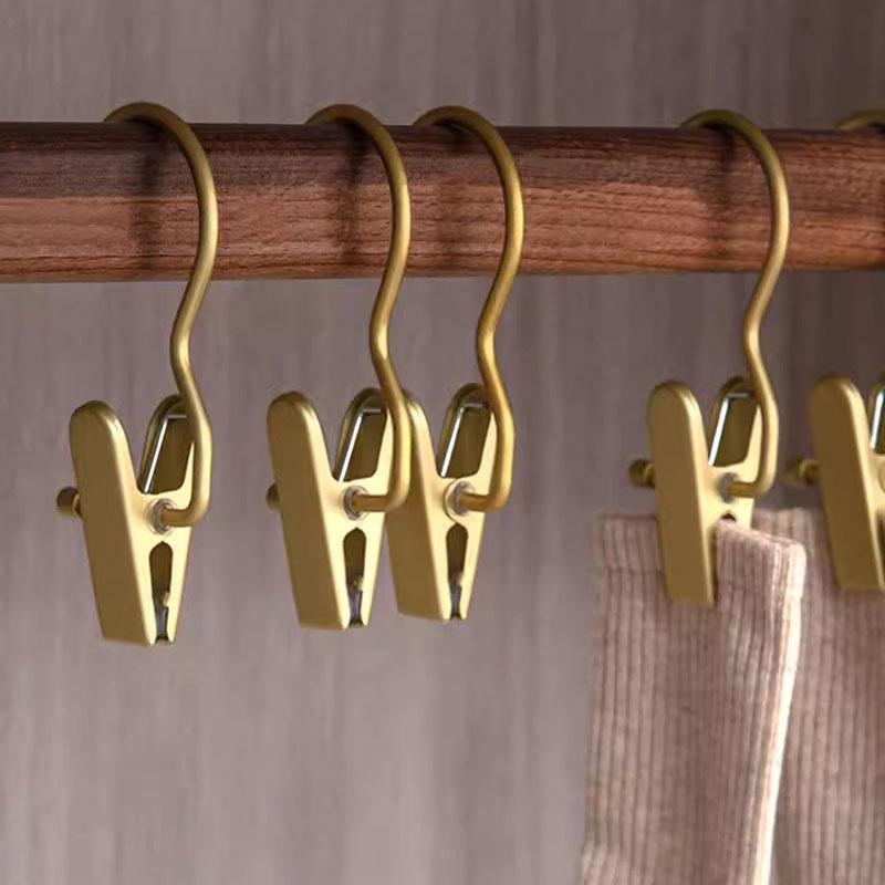 

1 шт. Вешалки для брюк Многофункциональные из алюминиевого сплава Зажимы для хранения шляп и сумок Вешалки для сушки одежды и брюк Бесшовные прищепки 1pc золотой