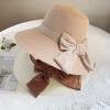 Hepburn style straw hat seaside vacation sun hat summer straw braided big brim temperament bow sun hat women's