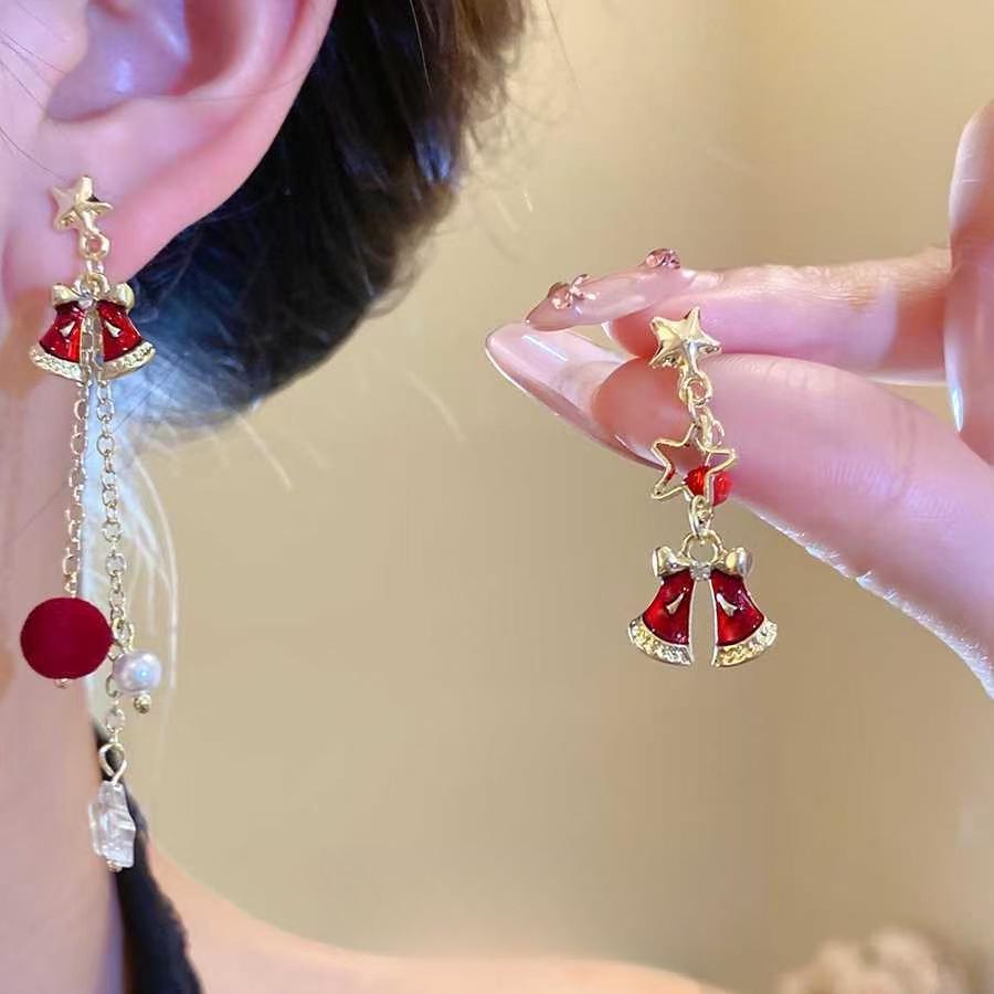 

Sterling Silver Asymmetrical Star and Bow Earrings - High-End Holiday Jewelry