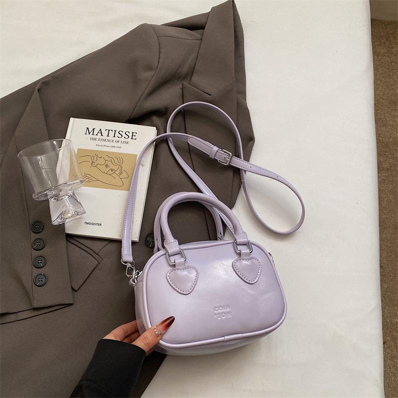 Summer popular small bag women's new fashion versatile messenger bag high-end portable bowling bag