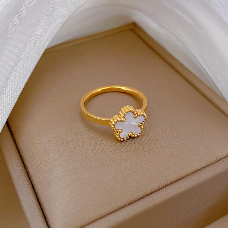 Nicht verblassende Schwarz-Weiß-Blumen Kalter Wind Tanzender Ring Männer und Frauen Tide Persönlichkeit Schlichter Zeigefingerring