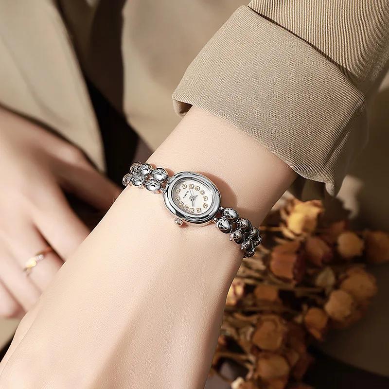 

Модный ретро браслет в форме капли воды, уникальный, компактный нишевый темперамент, градиентные многоцветные модные кварцевые часы