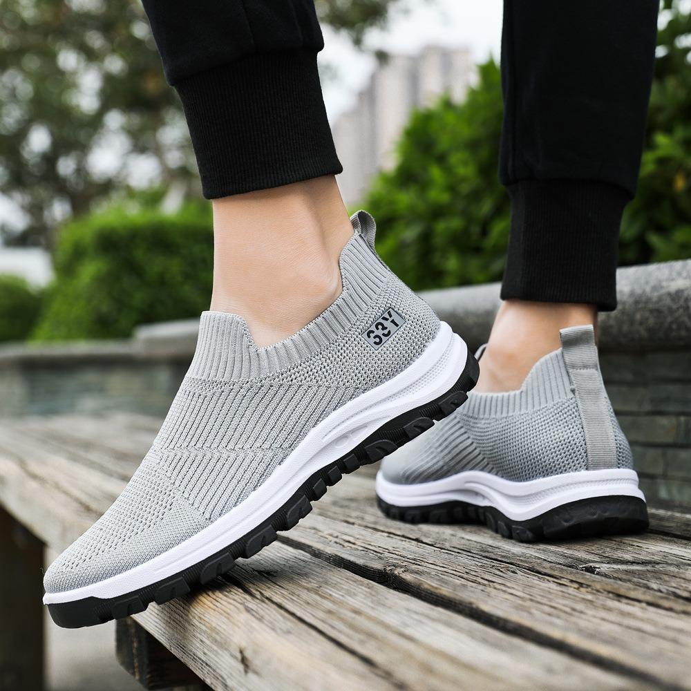 Flying woven breathable casual men's shoes one-pedal shoes lightweight flat-soled trendy shoes Korean version trendy walking shoes