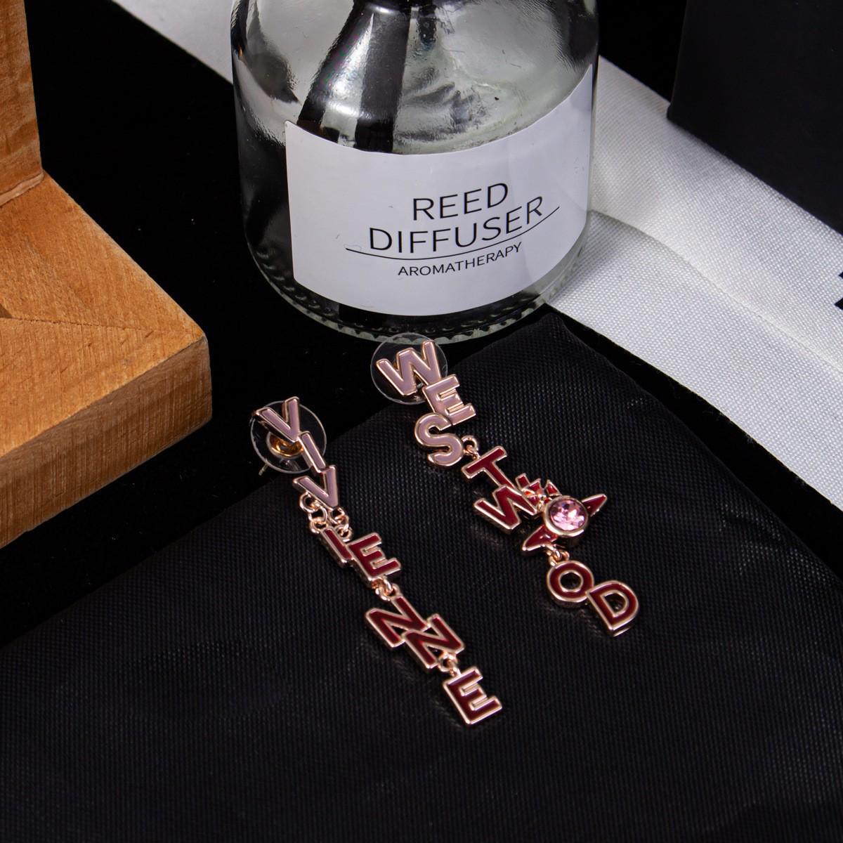 

Серьги-пусеты NANA Style Vivienne Westwood Асимметричные Сатурн с подвеской Капля Масло Бриллиант Буква