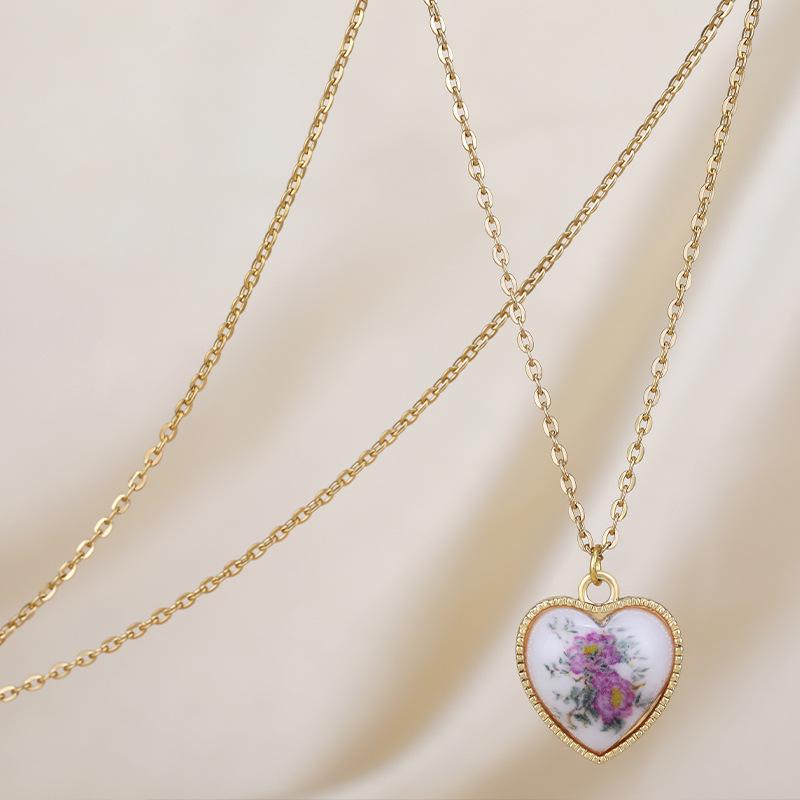 

Минималистичное натуральное керамическое ожерелье в виде персикового сердца - Игривый и нежный кулон.