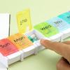 7-Day Portable Push-Button Pill Organizer with 7 Color-Coded Compartments