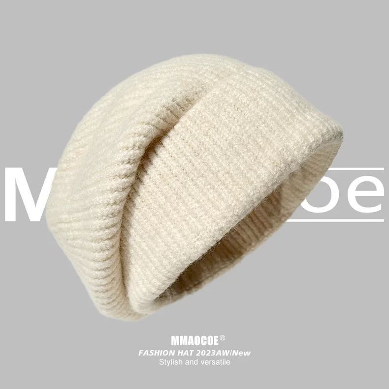 

Вязаная шапка детская зимняя новая теплая защитная шерстяная шапка корейская версия свободная шапка бежевый