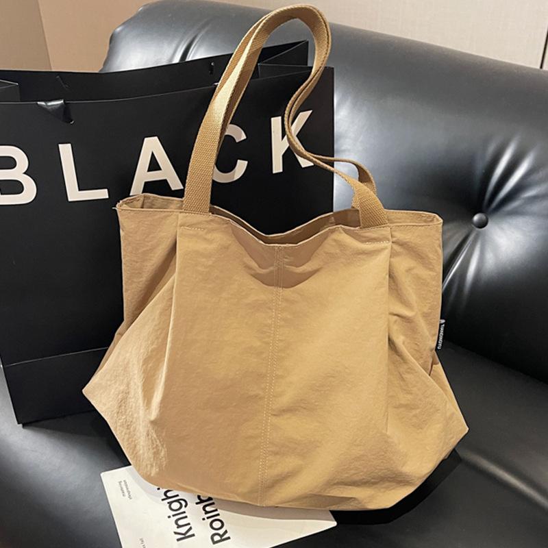 Minimalist Nylon Tote Bag with Spacious Design and Durable Handles Perfect for Everyday Use and Shopping