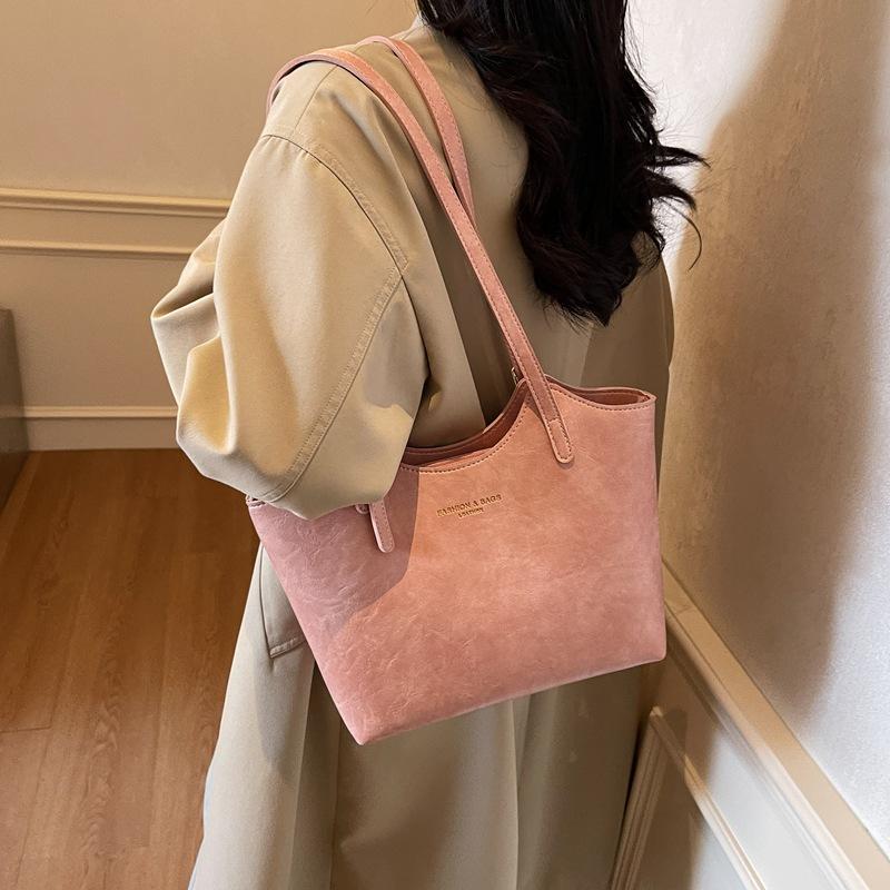 

Premium sense large-capacity commuter bag women s fashion new class 2025 women s handheld satchel shoulder tote bag розовый