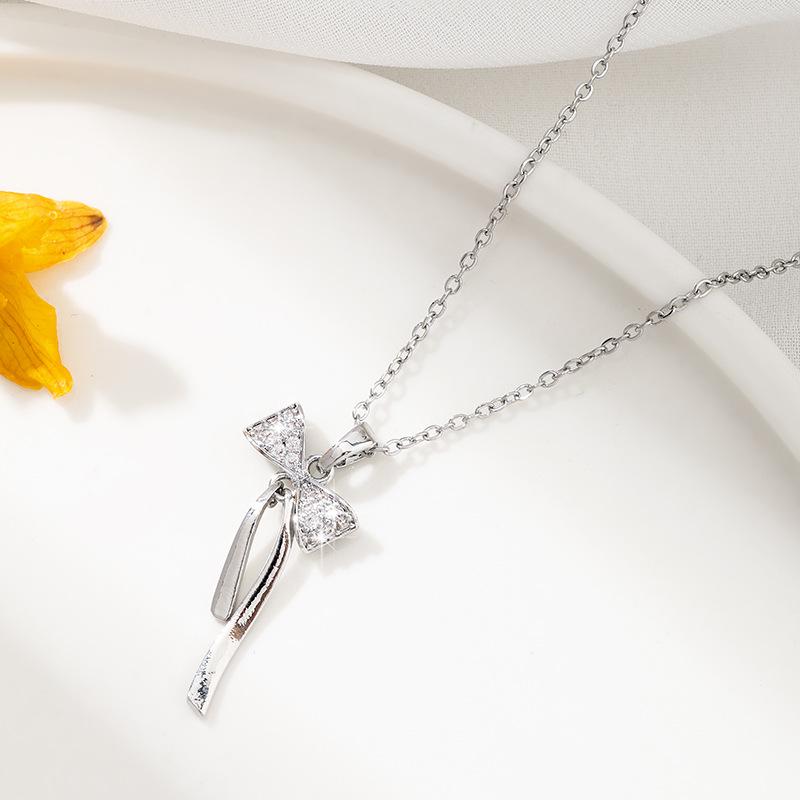 

European & American Bow Necklace in Titanium Steel with Micro-Inlaid Zirconia - Elegant Women s Light Luxury Collarbone Chain.