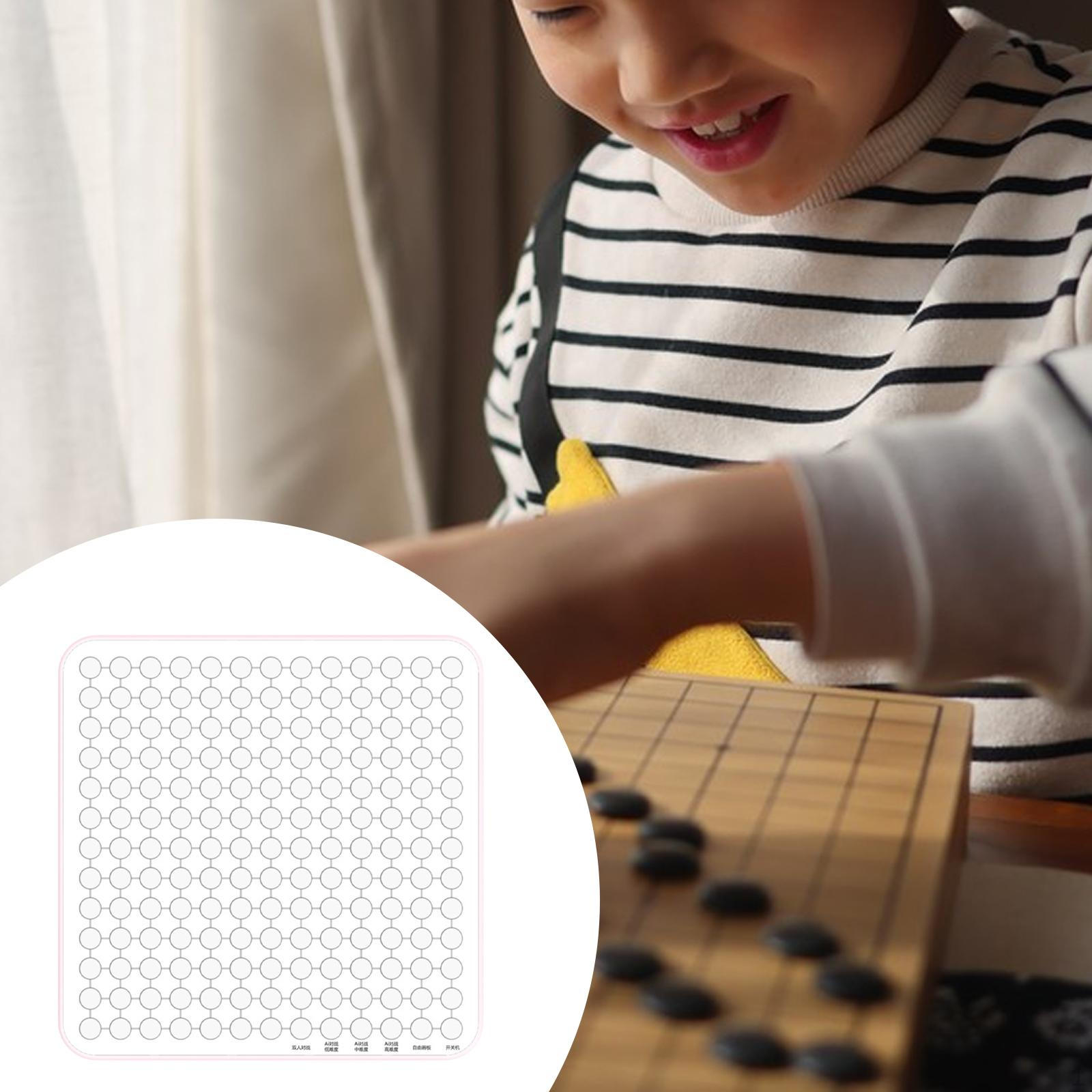 

Электрическая настольная игра Электронная шахматная доска Портативная многофункциональная Пять в ряд Умные шахматы розовый