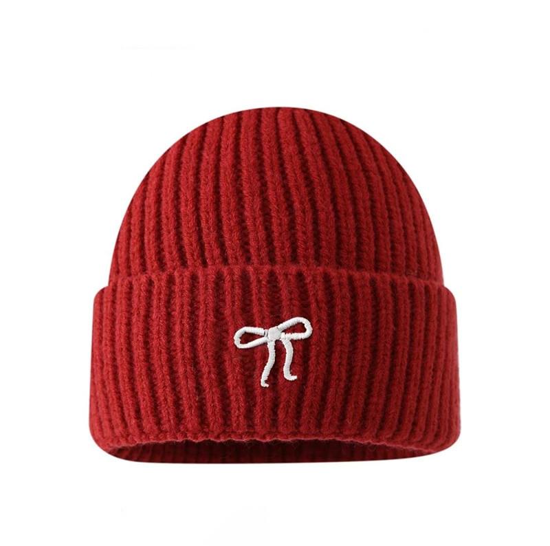 Knitted Winter Headgear For Women With Bow And Face Reducing Design красный