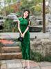 The first batch of 1011 spring clothes, the new model with rotator sleeves and velvet long cheongsam green, will be sent to the cheongsam skirt