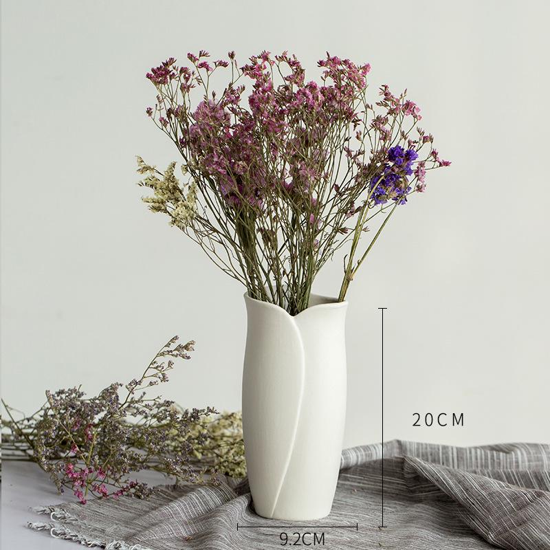 White Ceramic Vase with Dried Baby's Breath for Living Room or Dining Table Decoration