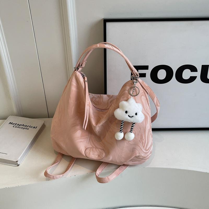 

Проста та універсальна сумка-тоут великої місткості жіноча 2024 літо корейська версія модна універсальна сумка на плече преміальна сумка під пахви