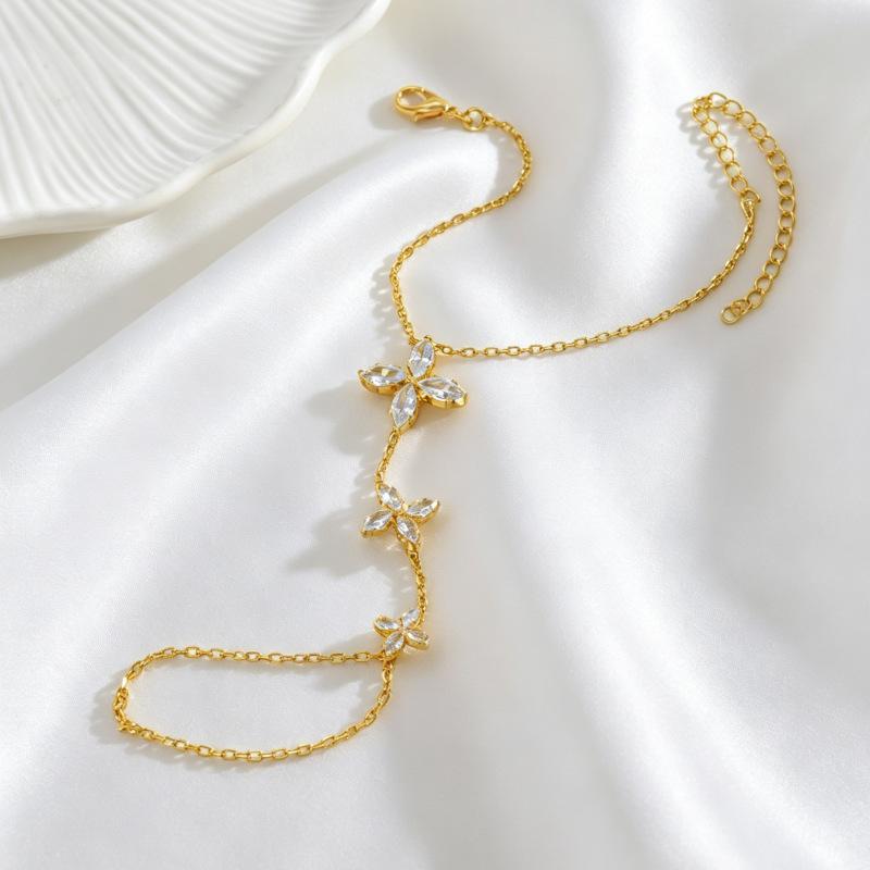Popular four-leaf flower finger bracelet simple temperament women's zircon back chain fashion jewelry