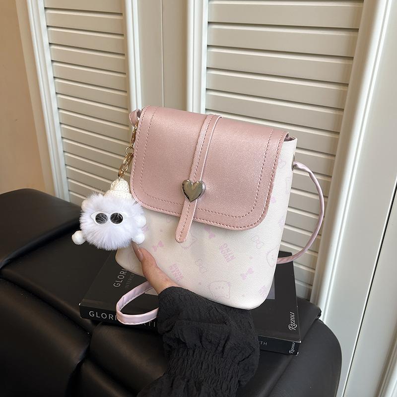

Niche cute bucket bag women s fashion hairball pendant new trendy summer versatile single shoulder messenger bag commuter bag Without pendant розовый