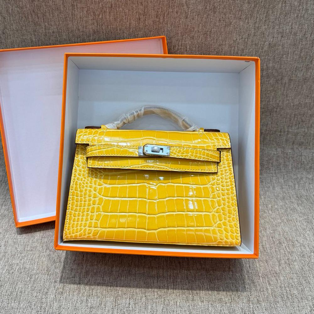 

Новая модная и универсальная сумка через плечо с цепочкой в виде свиного носа из натуральной кожи с рисунком крокодила и коровьей кожей первого поколения Length 22cm x Thickness 7cm x Height 14cm