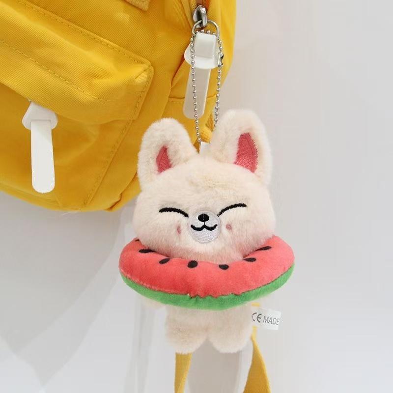 Plush SKZOO K-Pop Dolls with Character-Themed Attire and Display Stand