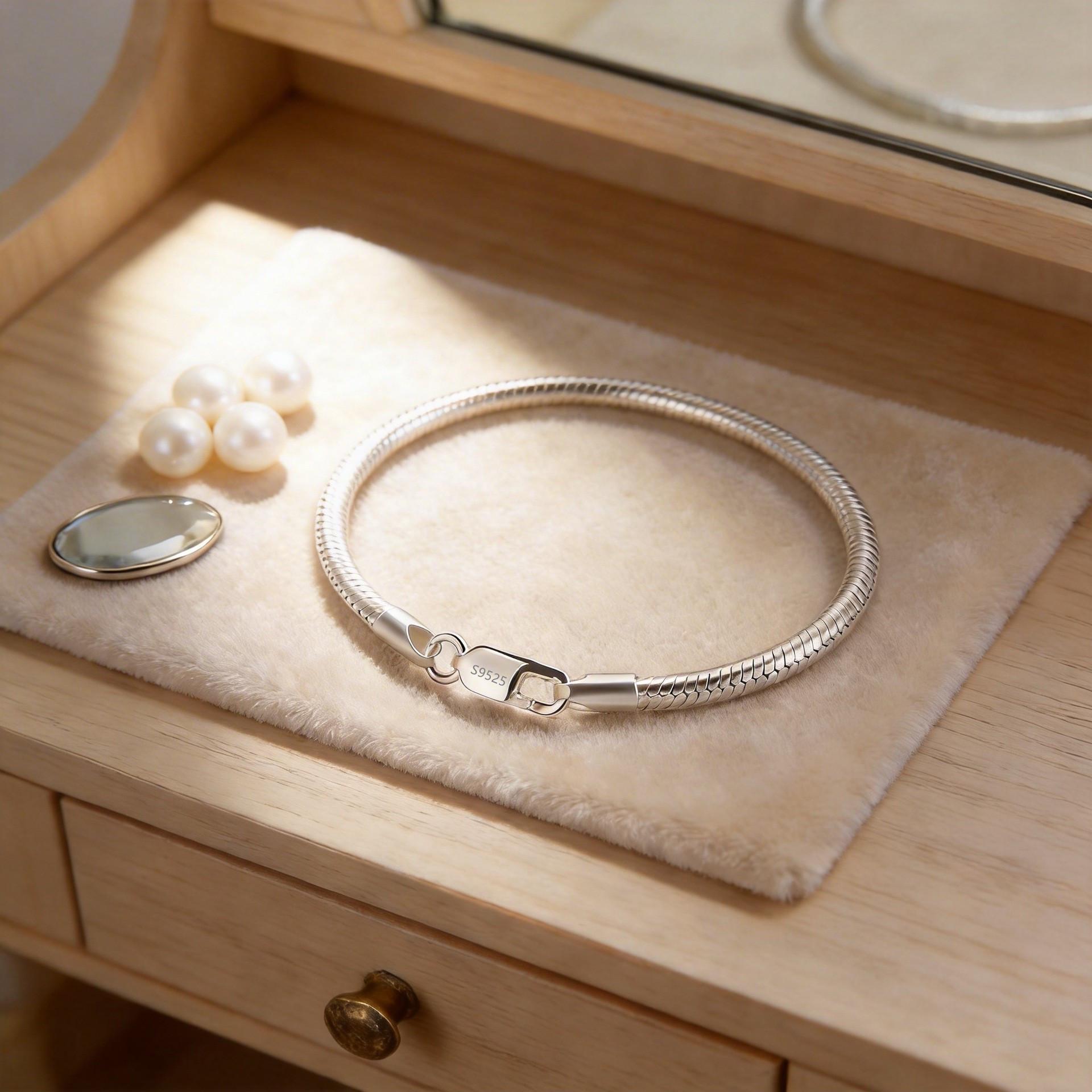 

S925 Sterling Silver Luxury Snake Bone Bracelet for Couples - Versatile and Elegant Design for Men and Women.