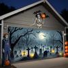 Halloween garage door banner featuring a spooky graveyard scene with bats, full moon and skull decorations