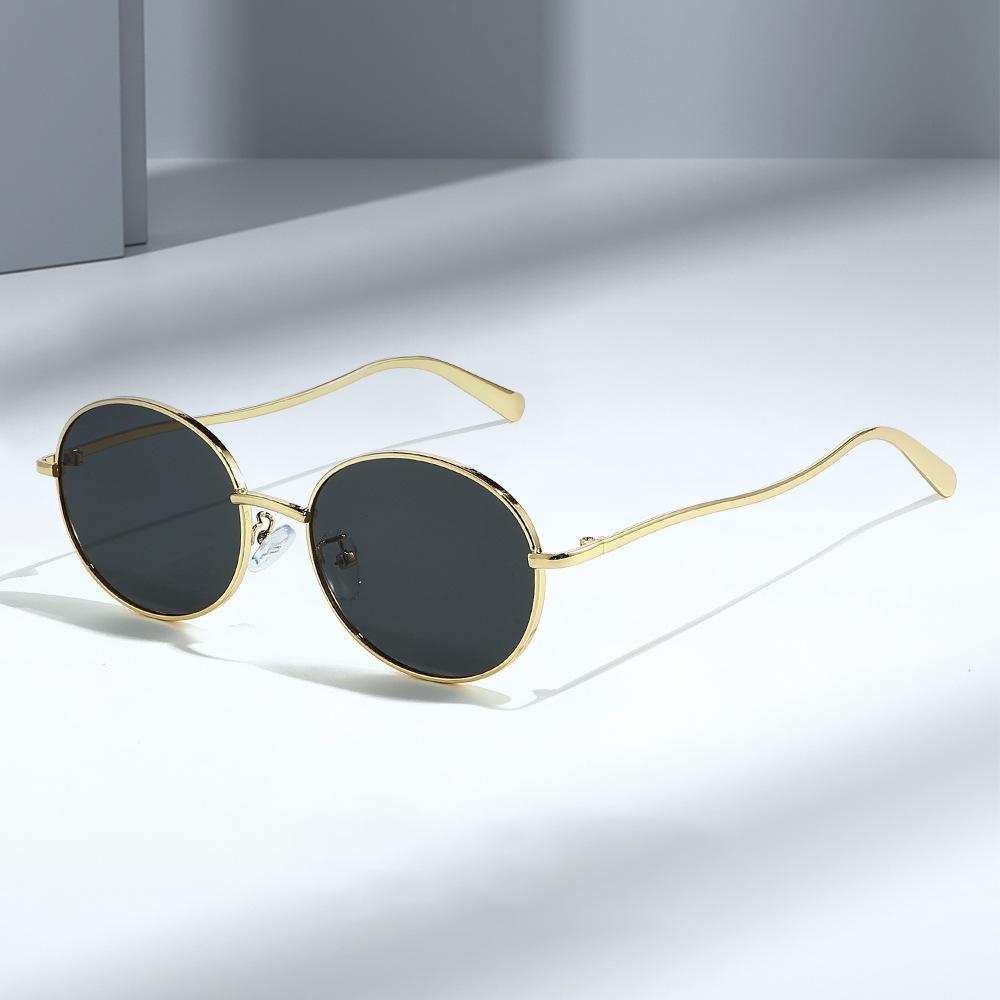 26 Metal-framed sunglasses, suitable for both men and women, offering UV protection