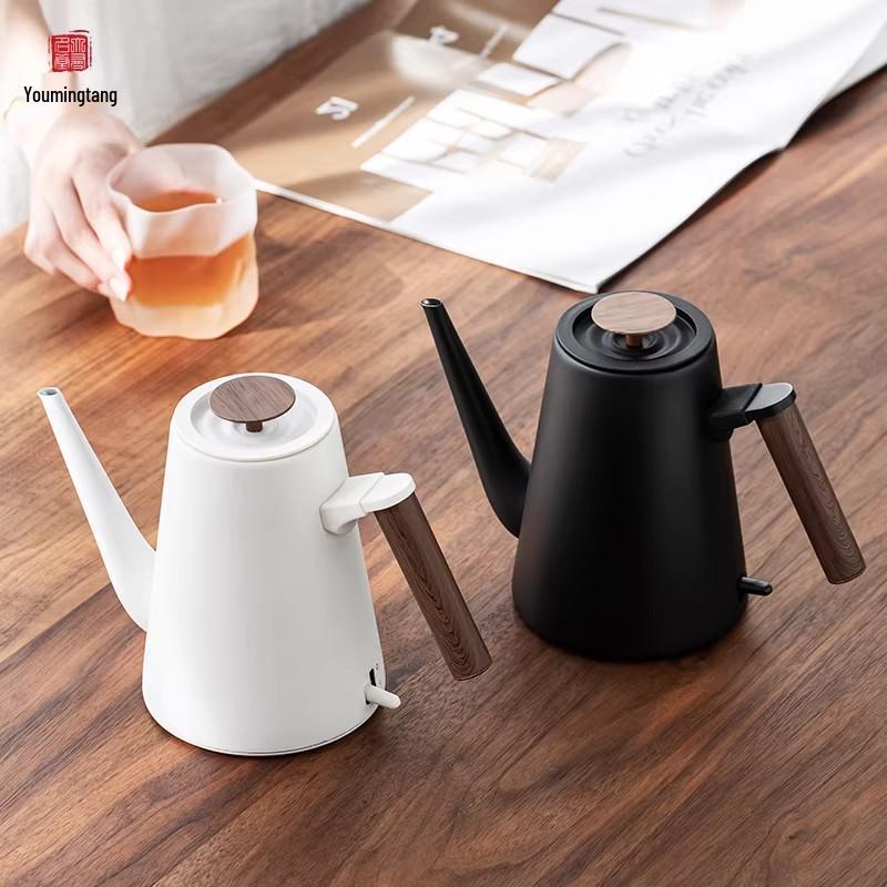 Youmingtang Black & White Electric Kettle: Fast Boiling for Home, Tea Brewing, Water Heating, and Hotel Use.