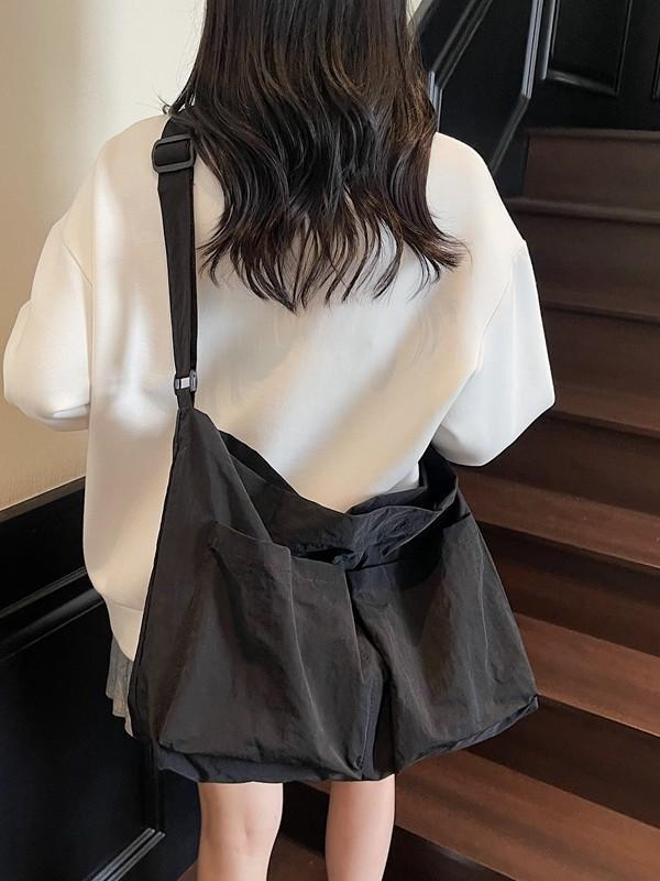 Borsa a tracolla minimalista in tela con chiusura a zip per uso quotidiano casual