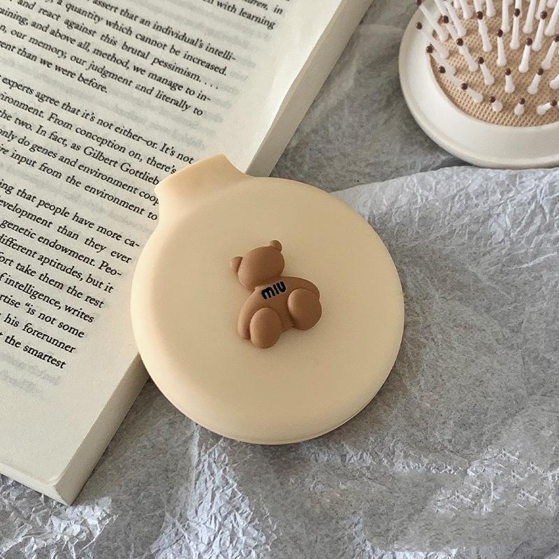 

Портативний складаний гребінець з повітряною подушкою з дзеркалом для масажу шкіри голови Мультяшний милий ведмедик Гребінець з повітряною подушкою Щітка для волосся 1pc бежевий