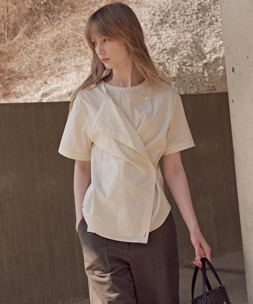 OSTKAKA Asymmetrical Round Wrap Shirt Cream