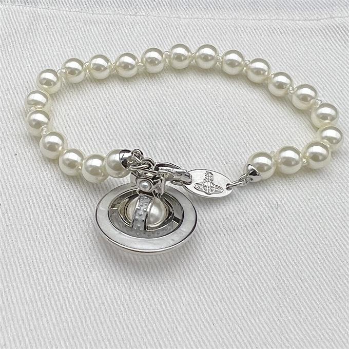 

Високоякісний кулон Сатурн Vivienne Westwood з перлами та емаллю - Мінімалістичний, Нішевий, Висококласний набір аксесуарів