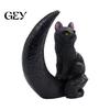 Durable Resin Cat Statue Halloween Figurine, Witch Hat/Moon/Pumpkin/Skull Black And White Ornament for Tabletop, Mantel, Shelf, Desk Decor Moon Skull