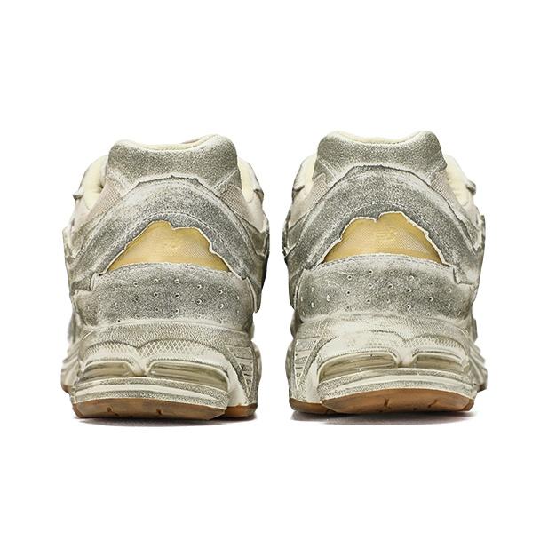 New Balance 2002R Protection Pack - Postarzane Sneakersy Unisex Białe Sól Morska Vintage-Pomarańczowe M2002RDG