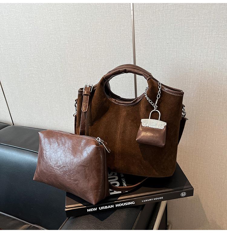 Retro suede portable bucket bag women's 2025 new fashion high-end sense child and mother bag commuter shoulder messenger bag