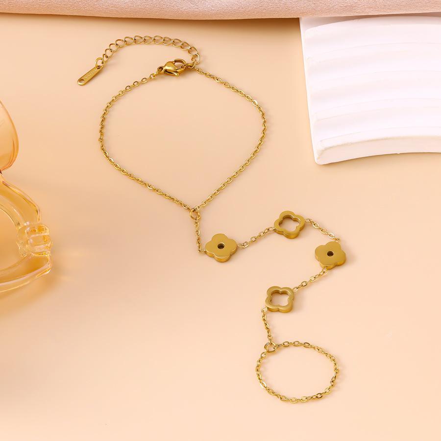 Titanium Steel Four-Leaf Clover Hollow Flower Hand Chain