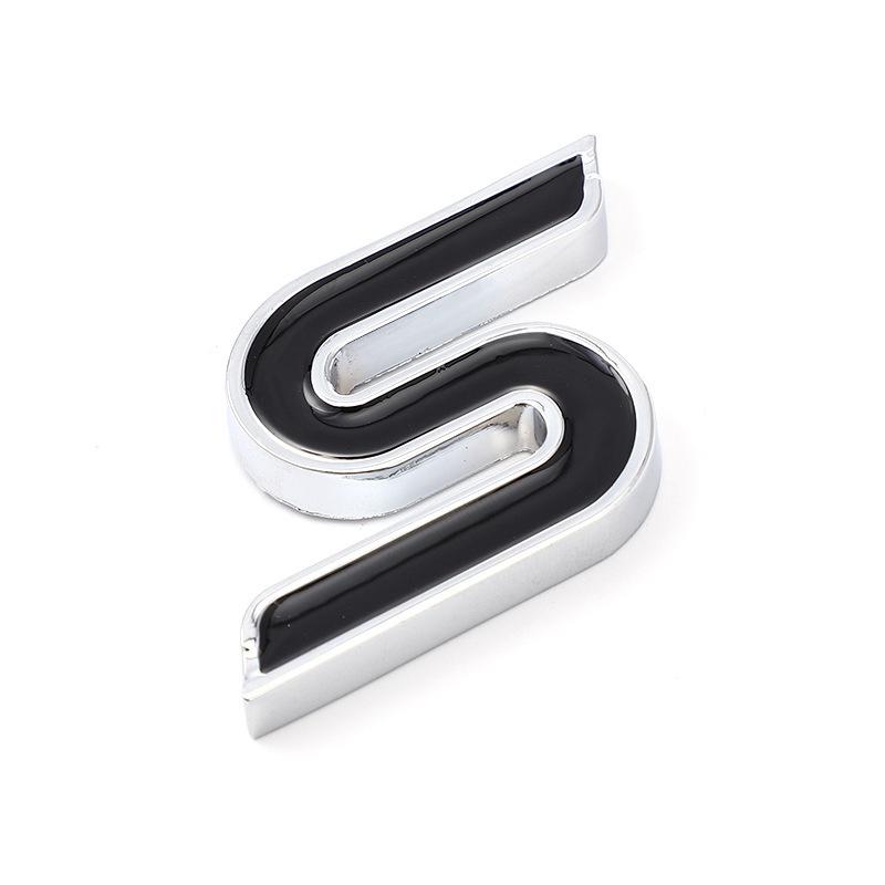 "S" Logo Car Emblem for Ford Mondeo, Focus, Fiesta & Other Modified Sport Models features a metal "S" design.