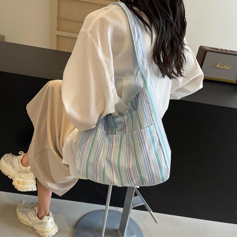 

Japanese and Korean dopamine striped canvas bag, student class handbag, large capacity underarm bag, summer fairy vest bag синий