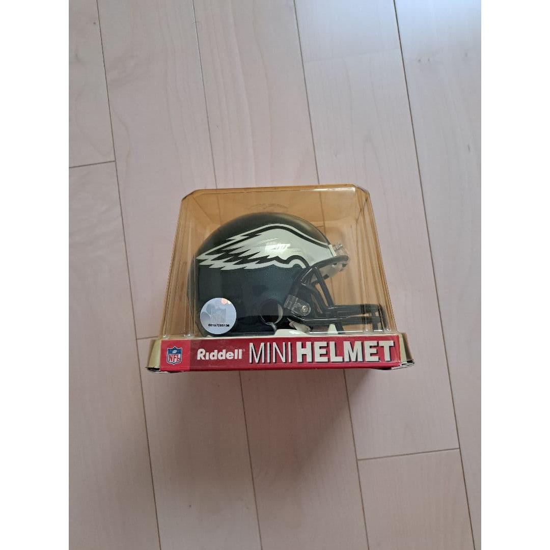 Used NFL mini helmet & trading cassette set