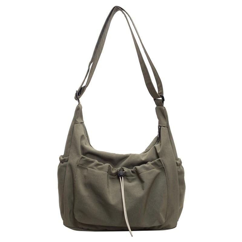Canvas Ladies Crossbody Bag With Solid Color Drawstring Design For Daily Use And Urban Style